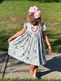 Floral flow dress. High waist. Cute tie in the back. Super flowy. Comfortable and soft. Flutter Sleeve Dresses With Smocked Back For Garden Party, Garden Party Dress With Smocked Back And Flutter Sleeves, Flowy A-line Dress With Smocked Back, Flowy A-line Breezy Dress, Flowy Floral Dress With Smocked Back And Short Sleeves, Flowy A-line Sundress For Dress Down Occasions, Spring Flutter Sleeve Dresses For Daywear, Flutter Sleeve Dresses For Spring Daywear, Spring Daywear Dress With Flutter Sleeves