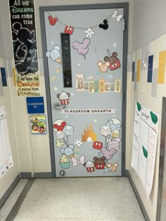 a classroom door decorated with mickey mouse and other items for the school's decorations