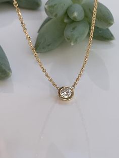 Diamond Solitaire Necklace in 14k Yellow  GoldMetal—14k Yellow Gold ( solid gold )—Bezel setting —Diamond weight-—0.20CT—Diamond Color——G—Diamond quality-—SI1 NATURAL DIAMONDAvailable in Rose Gold tooNecklace is 18" , we can add a loop to make it adjustable to 16" 14k Gold Solitaire Necklace With Bezel Setting For Anniversary, Fine Jewelry Solitaire Necklace With Smooth Bezel As Gift, Yellow Gold Solitaire Necklace With Bezel Setting For Anniversary, Gold Solitaire Necklace With Bezel Setting As Gift, Gift Yellow Gold Solitaire Necklace With Bezel Setting, Gold Solitaire Necklace With Smooth Bezel As A Gift, Yellow Gold Birthstone Necklace With Bezel Setting For Anniversary, Classic Gold Solitaire Necklace With Smooth Bezel, Yellow Gold Solitaire Necklace With Bezel Setting