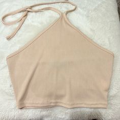 Shein Ribbed Open Back Halter Top. This Top Is Cropped As Well As Being Able To Be Tied Around The Neck For An Open Back Look. Brand New And Never Used! Size Xs. Beige Seamless Crop Top, Beige Ribbed Crop Top Tank, Solid Ribbed Halter Neck Top, Fitted Beige Cropped Halter Top, Beige Fitted Cropped Halter Top, Beige Fitted Halter Neck Crop Top, Ribbed Tops For Beach, Summer Ribbed Beige Crop Top, Summer Beige Ribbed Crop Top