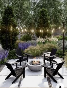 an outdoor fire pit surrounded by lawn chairs