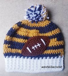 Warm and cozy unisex beanie crocheted with sports yarns. This adorable beanie will be perfect for any Wisconsin Pacers fan in your family. The crocheted football appliqué makes it even more special.    Machine Wash and Dry.  Yarn: 100% Acrylic The matching crocheted football slippers are sold seperately.  They are the perfect finishing touches for a newborn photoprop. One Size Beanie For Sports Events, One Size Fits Most Beanie For Sports Events, One Size Fits Most Sports Beanie, Crochet Yarn Beanie Cap, Crochet Football Hat, Football Crochet, Crochet Football, Nfl Hats, Crochet Beret