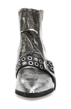 Crackled metallic leather tanned and treated by hand brings vintage-inspired beauty to a moto-style bootie refreshed with a studded buckle strap. 2 1/2" heel 4 1/4" shaft Side zip closure Cushioned insole Leather upper and lining/synthetic sole Imported Punk Leather Moto Boots With Silver Studs, Silver Punk Boots With Rivets, Leather Moto Boots With Rivets For Festival, Silver Leather Moto Boots For Fall, Wedge Bootie, Moto Style, Metallic Leather, Bootie, Side Zip