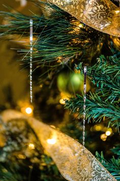 a christmas tree with ornaments hanging from it