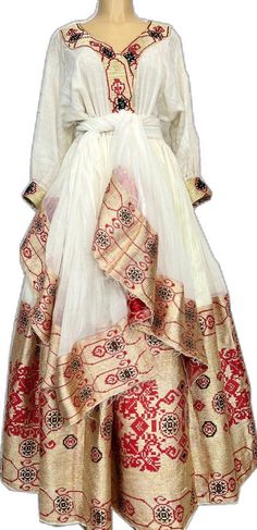 Elegant Ceremonial Dresses For Navratri, Traditional Semi-stitched Cutdana Dresses, Traditional Dress With Cutdana For Eid, Traditional Cutdana Dress For Eid, Traditional Long Sleeve Gown For Ceremonies, Traditional Cutdana Dresses For Ceremonies, Traditional White Gown For Transitional Seasons, Traditional Wedding Gown With Traditional Patterns, Traditional Drape Cutdana Dress For Festivals