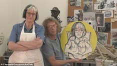 two women standing next to each other in an art studio