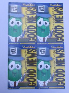 four veggie - man movie tickets sitting on top of each other