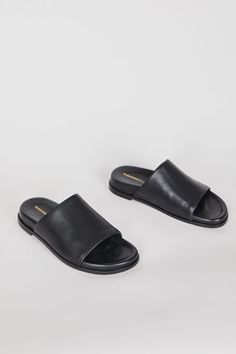 MEET PIPPY Minimal and effortless, we love PIPPY for all the ease of an ultra padded slip on. Luxe leathers and comfy footbed make this iconic slide new again. Leather upper Leather lining Memory foam footbed Heel .5 inches Made in China FREE DOMESTIC SHIPPING AND RETURNS ON ALL ORDERS OVER $200 Any item sold at a discount greater than 30% is not refundable/returnable. Serve Board, Black Leather Slides, Paris Shoes, Slingback Mules, Clarks Wallabees, Oxford Platform, Black Slides, Sandals For Sale, Womens Sandals Flat