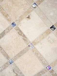 a tile floor that has been cleaned and is being used as a bathroom wall decoration