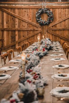 a long table is set up with christmas decorations