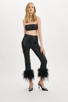 These cropped length trousers are crafted from luxurious faux leather, designed with a high-rise, straight-leg fit and adorned with flouncy feather detailing at the hem. Pair them with the GALIA blazer to elevate your glamour. Leather Industry, Polyester Pants, Hem Style, Leather Pieces, Leather Dress, Puffer Coat, Flare Pants, Silk Blouse, Two Piece Pant Set