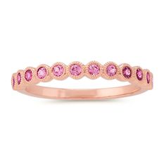 Show her how much she means to you with this band  featuring 12 round pink sapphires  at approximately .35 carat total weight. Set in 14 karat rose gold  each stone has been hand-selected and hand-matched to make this the perfect way to tell her you love her. The wedding band is approximately 1.5mm wide. Jewelry Cleaning Solution, Pink Sapphire Ring, Weight Set, Ring Stack, Platinum Jewelry, Filigree Design, Sapphire Jewelry, Natural Sapphire, Tell Her