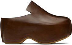 JW Anderson: Brown Leather Platform Clogs | SSENSE Brown Calf Leather Slip-on Mules, Brown Almond Toe Mules With Sculpted Heel, Brown Calf Leather Closed Toe Mules, Modern Brown Almond Toe Slip-ons, Brown Mules With Sculpted Heel For Work, Brown Leather Mules With Sculpted Heel, Modern Brown Mules With Almond Toe, Brown Leather Loafers With Sculpted Heel, Leather Clogs With Sculpted Heel And Almond Toe