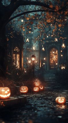 pumpkins lit up on the ground in front of a house