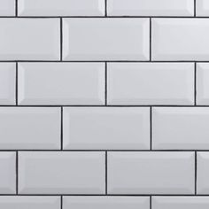 a white brick wall is shown in this image