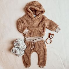 Petit Nordique's newest Sherpa collection is what dreams are made of. Lightweight, soft and warm. What more could you want for your mini? Pair the Crew or Hoodie with the Pants to complete the perfect winter outfit for your little one! Pictured from left to right is Fawn and Teddy. Machine Wash 30 degrees, do not tumble dry and do not dry clean. Wash with similar colours. Designed and fabricated in Canada Bear Outfit, Perfect Winter Outfit, Olli Ella, Bear Outfits, Winter Outfit, Little One, Winter Outfits, Kids Fashion, Dry Clean