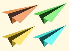 three different colored paper airplanes are shown