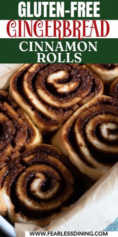 cinnamon rolls in a pan with text overlay reading gluten - free gingerbread cinnamon rolls