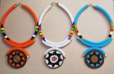 100% handcrafted using fine beads. Bright colors that will make you stand out from the rest. *This listing is for 5 necklaces. All different colors. Dimensions; 19 inches around the neck, 4 inch pendant. The closure is an S shape clasp. **Buy multiple items and pay shipping for 1 item only. More neckleces here; https://www.etsy.com/shop/TribalTess?ref=seller-platform-mcnav&section_id=21306083 Back to my shop; https://www.etsy.com/shop/TribalTess?ref=seller-platform-mcnav White Beaded Round Pendant Necklaces, Unique Pendant Beaded Necklace, Unique Long Beaded Necklace, Long White Beaded Necklace, Large Beads Round Pendant Necklace As Gift, Multicolor Large Beaded Round Pendant Necklace, Necklaces With Polished Round Beads, Round Pendant Necklace With Large Beads As Gift, Gift Choker With Round Beads