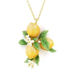 a necklace with lemons and flowers on it