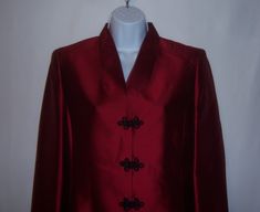 "Vintage Dana Buchman burgundy merlot or dark scarlet red Asian style silk blazer or suit jacket.  Good pre-owned condition.  No holes, rips, tears, etc.  Women's size 10P or PETITES.  Measurements:  bust-40\", length-23\".  100% silk.  Front frog style button closure.  Lined." Elegant Burgundy Semi-formal Outerwear, Elegant Burgundy Outerwear For Party, Elegant Burgundy Party Outerwear, Elegant Burgundy Blazer For Party, Elegant Burgundy Party Blazer, Red Fitted Silk Outerwear, Red Silk Fitted Outerwear, Burgundy Long Sleeve Blazer For Formal Occasions, Burgundy Formal Blazer