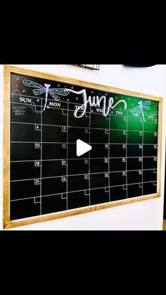 a chalkboard with the word june written on it