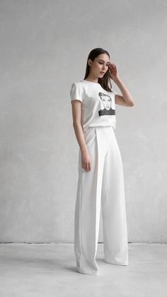 Discover the charm of our white palazzo trousers, expertly crafted from luxurious viscose fabric. Perfect for any body type, these handmade wide leg pants elegantly conceal the hips and enhance the waist, offering a silhouette that's both flattering and effortlessly chic. Ideal for versatile styling, they pair seamlessly with everything from shirts and bodysuits to T-shirts, making them a staple in women's clothing. ▪️ STYLE DETAILS - Relaxed fit with elastic waistband  - High waist  - Wide legs Elegant White Straight Culottes, Elegant White Culottes, Elegant Wide-leg Wedding Pants, Elegant Wide Leg Pants For Wedding, Elegant White Wide Leg Culottes, White High-waisted Culottes For Work, White Ankle-length Wide Leg Pants For Formal Occasions, Elegant White Culottes For Spring, White Elegant Culottes For Spring