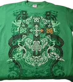 Vintage Irish Motif, Tee-shirt - Green Extremely Unique Adult Large Delta Pro Weight tag 50% Cotton & 50% Polyester Made in Honduras   USPS First Class Mail Taxes may be applicable at checkout Buyer pays shipping on any returns Green Band Merchandise T-shirt, Green Band Merch T-shirt For Fans, Green Pre-shrunk Band Merch T-shirt, Green Band Merch Shirt With Screen Print, Green Band Merch Top With Sublimation Print, Casual Green T-shirt For St. Patrick's Day, Green Sublimation Print Tops For Fan Merchandise, Green Crew Neck Tops For St. Patrick's Day, Green Tops With Sublimation Print For Fan Merchandise