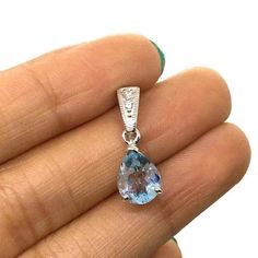 Sky Blue Topaz Pendant Gemstone Pendant 925 Sterling | Etsy Teardrop Blue Topaz Jewelry In White Gold, Teardrop Blue Topaz White Gold Jewelry, White Gold Teardrop Blue Topaz Jewelry, Blue Drop Jewelry With Prong Setting, Blue Topaz Gemstone Drop Jewelry, Fine Jewelry Blue Topaz Gemstones In Silver, Blue Topaz Pear-shaped Jewelry, Dazzling Silver Jewelry With Blue Topaz, Drop Shaped Topaz Jewelry For Anniversary