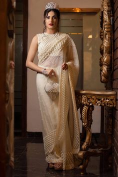 Ivory sequin and bead embroidered saree. Paired with an all over embroidered checkered pattern padded blouse and petticoat. - Aza Fashions Padded Blouse, Embroidered Saree, Blouse For Women, Saree With Blouse, Checkered Pattern, Petticoat, Aza Fashion, Western Fashion, Blouses For Women