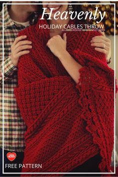 a woman wrapped in a red blanket with the words heavenly holiday cables throw on it