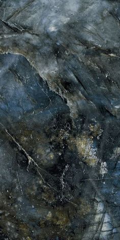 an abstract marble background with blue and gold paint on the top, bottom and bottom