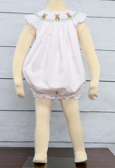 "Nothing is cuter or sweeter than a handmade smocked Easter Dress. My first Easter outfit is a white bishop sleeve baby girl romper that has smocked brown Easter bunnies. Matching Easter outfits for siblings is available in separate listings. https://www.etsy.com/listing/265551717/white-boys-easter-outfit-baby-boys?ref=listings_manager_grid https://www.etsy.com/listing/267161008/easter-bunny-romper-for-boy-babys-first?ref=listings_manager_grid *Zuli Kids Premium Quality *65% cotton 35% Poly *Mac Cute Pink Bubble Romper With Smocked Back, White Smocked Cotton Bubble Romper, Cute Pink Bubble Romper With Smocked Bodice, White Cotton Smock Bubble Romper, White Bubble Romper With Smocked Back For Spring, Spring White Bubble Romper With Smocked Back, Cute White Bubble Romper With Smocked Bodice, Cute Smocked Puff Sleeve Dress, Smocked Back Fitted Bubble Romper For Playtime