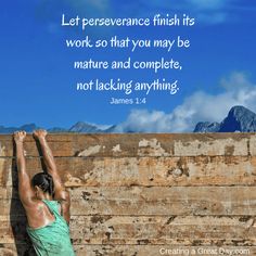 a woman reaching up against a wooden wall with a bible verse written on the side