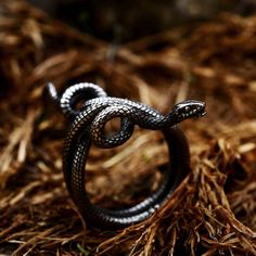 Snake rings or serpent rings have been popular throughout history and often represent eternal love.... Engraved Metal Snake-shaped Jewelry, Snake-shaped Engraved Rings For Gifts, Snake Shaped Engraved Rings For Gifts, Engraved Snake-shaped Rings For Gifts, Engraved Snake Shape Ring For Gift, Unique Engraved Snake Jewelry, Unique Handmade Snake Ring, Wild Snake, Snake Rings