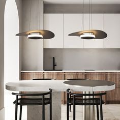 an image of a kitchen setting with modern lighting