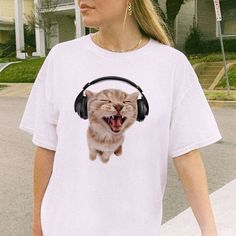 Rock this meow-mazing white T-shirt with a purr-fectly adorable cat in headphones. Made with 100% cotton, it's the most paw-some addition to your wardrobe. Y2K, trendy, and aesthetically twisted! Cute Cat With Headphones, Cat Wearing Headphones, Cat With Headphones, School Appropriate Outfits, Headphones White, Wearing Headphones, Wearing Headphone, White Headphones, White Tee