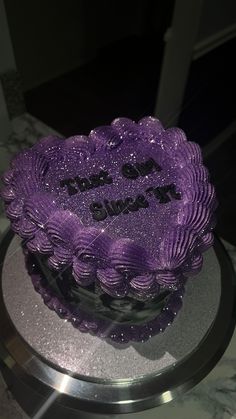 a purple frosted birthday cake with the words, i do not want to forget