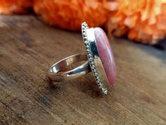 Handmade Rhodochrosite bohemian ring , you can wear this ring as a party wear ring .. Title - Rhodochrosite stone ring Stone color - Pink Stone shape - Oval Material - Sterling silver 925 Note - We use natural gemstones, so color shade may be little bit different .. we are giving you best quality rings on best price .. contact us for more quantity Bohemian Sterling Silver Ruby Ring, Handmade Pink Oval Ruby Ring, Handmade Pink Ruby Ring In Sterling Silver, Unique Handmade Pink Ruby Ring, Handmade Unique Pink Ruby Ring, Bohemian Pink Gemstone Rings, Handmade Bohemian Pink Ring, Pink Stone Ring, Quality Rings