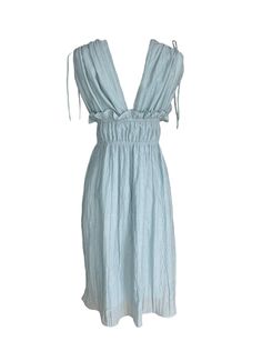 Ethereal and the color of blue skies and lapping waves. Our Goddess dress is light and airy with drawstring shoulder and ruched elastic empire waist detailing. 100% cotton deadstock cotton voile One Size S/M Chest width flat 18" Empire elastic waist flat 13", stretches to 19" Hip width flat 24" Body length from shoulder 42" Fully lined Hand wash cold, line dry, or dry clean Consciously made in small batches in sunny California using deadstock fabrics and recycled materials. Seasonless essentials Light Blue Ruched Bodice Dress For Summer, Light Blue Ruched Bodice Summer Dress, Light Blue Summer Dress With Ruched Bodice, Blue Cotton Dress With Gathered Waist, Spring Blue Midi Dress With Elastic Waistband, Blue Daywear Dress With Ruched Bodice, Blue Dress With Ruched Bodice For Daywear, Light Blue Ruched Dress For Beach, Blue Midi Dress With Ruched Bodice For Summer