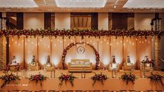 a decorated stage set up for a wedding