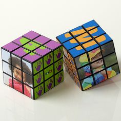 two rubik cubes sitting on top of each other