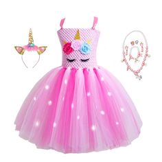 Unicorns are mesmerizing characters that our little girls love to have. Take their fun play into greater excitement by wearing this Glowing LED Light Unicorn Girls Party Tulle Dress. A certified safe glowing unicorn dress that makes them feel and look the prettiest on whatever occasion they attend. Features: Neatly crocheted top accentuated with floral and unicorn design appliques. Installed with lightweight LED glowing effects. Mid-calf-length comfortable tutu dress. Rainbow sweet and bright co Unicorn Dress, Unicorn Girl, Glow Effect, Unique Kids, Unicorn Design, Mesh Skirt, Girls Love, Girls Party, Tutu Dress