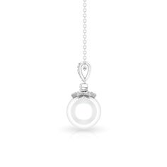 Product Details Make a captivating statement of love with this stunning Diamond and Pearl Pendant. Featuring a Round Shaped Freshwater Pearl solitaire delicately suspended as a drop in a Bead Setting, this pendant exudes elegance. The Bail is adorned with beautifully arranged Round Diamond, adding a touch of brilliance. Embrace this exquisite Pearl Drop Pendant as the perfect choice to propose to your beloved lady love this Valentines Day, symbolizing your enduring affection and devotion. Produc Diamond Drop Pendant, Pearl Drop Pendant, Drop Pendant Necklace, Round Moissanite, Diamond Drops, Drop In, Drop Pendant, Pearl Drop, Pearl Pendant