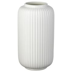 a large white vase sitting on top of a table