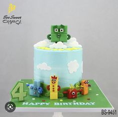 a birthday cake with an image of a green monster in the bathtub on top