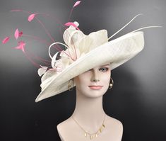 "Buying a hat? Don't forget to send me  your head measurement before placingyour order! IF YOU LIKE THE DESIGN, JUST WANT TO ADD SOME COLORS TO MATCH YOUR DRESS, PLEASE FEEL FREE TO CONTACT ME, I WILL HELP YOU.This beautiful sinamay hat is an elegant wear at any church or derby event. its sinamay material is not too intimidating and attracts the eye. The chic flower adnorment that rests on the wide, side sweep brim is complemented by sinamay accentuations. Material: Sinamay with feathers Crown W Cream Wide Brim Costume Hat, Fitted Cream Wide Brim Costume Hat, Fitted Cream Hat With Curved Brim, Cream Curved Brim Fitted Hat, Beige Fitted Costume Hat With Short Brim, Cream Short Brim Fitted Mini Hat, Cream Fitted Mini Hat With Wide Brim, Cream Fitted Mini Hat With Short Brim, Cream Fitted Wide Brim Mini Hat