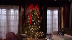 a decorated christmas tree in a living room