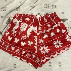 Like New Never Worn Color: Red & White Christmas Designs Length: 10.8inch Good Stretch At The Hip Casual Christmas Holiday Bottoms, Red Casual Shorts For Pajama Party, Casual Red Shorts For Pajama Party, Red Bottoms For Christmas Holiday, White Bottoms For Christmas Holiday, Casual Red Holiday Bottoms, Casual Red Bottoms For Holidays, Casual Red Bottoms For Christmas, Christmas Shorts