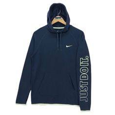 Vintage Nike Swoosh Just Do It hoodie in navy blue colour. Embroidered logo on the chest. Still in good condition. SEE THE PICTURES FOR MORE DETAILS. CONDITION : 9/10 MEASUREMENT Pit : 19.5 inch Length : 26 inch Shoulder : - Arm Length : 29 inch Size On Tag : S Recommended Size : XS-S PAYMENT We accept PayPal only. The item will be ship 3-5 days once the payment has been made. SHIPPING DHL ONLY. USUALLY AROUND 7-21 DAYS BEFORE REACH THE DESTINATION. *NOTES TO BUYERS* PLEASE DO NOT RELY ON THE SI Sporty Crew Hoodie With Logo Print, Navy Athleisure Hoodie For Sports, Navy Hoodie Sweatshirt In Athleisure Style, Sports Hoodie Sweatshirt With Embroidered Logo, Navy Athleisure Hoodie Sweatshirt, Nike Blue Sweatshirt, Blue Sweatshirt With Embroidered Logo For Sports, Sports Season Hoodie With Embroidered Logo, Navy Hoodie For Sports Season